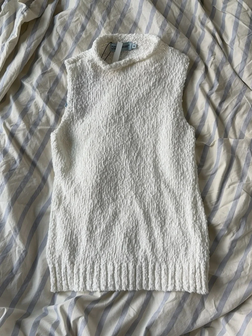 Cream Sleeveless Knit Mock-Neck top